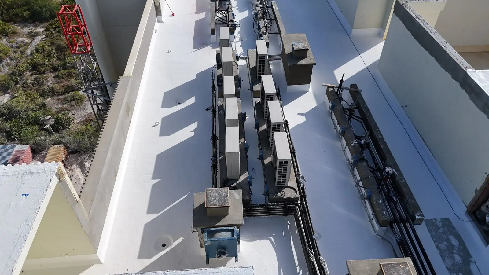 Overhead view of the coated rooftop and rows of mechanical equipment, St. Regis, Turks and Caicos